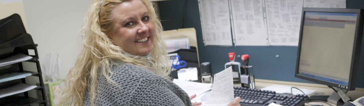 A-professional-woman-working-at-her-desk-000008553665_Large-cropped_0.jpg